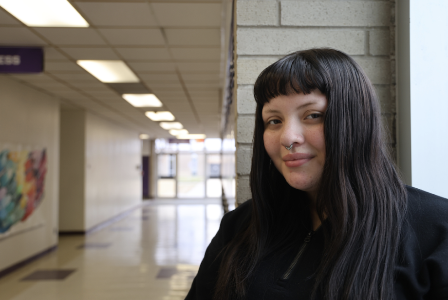 High school senior Salena Jannsens poses for a photo in the school hallway