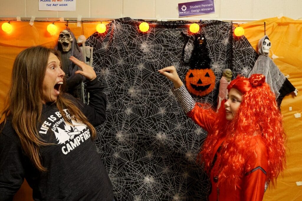 A witch casts a spell on her mother Oct. 29, 2024, during Edward Stone Middle School’s third annual Haunted Halls event. 