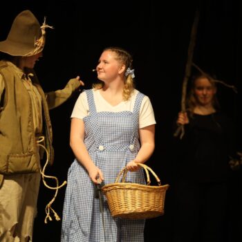 Dorothy meets the Scarecrow during the high school musical production of 