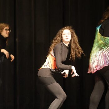 Students dressed as jitterbugs dance onstage during the high school musical production of 