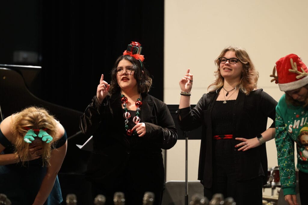 Members of the Purple Aires perform “Fruitcake” Dec. 16, 2024, at Edward Stone Middle School. This year marked the 50th year that “Fruitcake” has been a part of Burlington High School’s Holiday Jazz Concert.