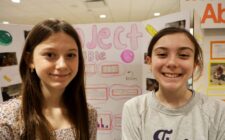 Tuscany Sparrow and Claire Lafferty, sixth-graders at Aldo Leopold Intermediate School, pose for a photo alongside their 