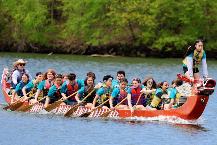 Burlington High School students row while competing Sunday, May 4, 2025, in the 35th annual Dragon Boat races at Lake Geode in Danville.